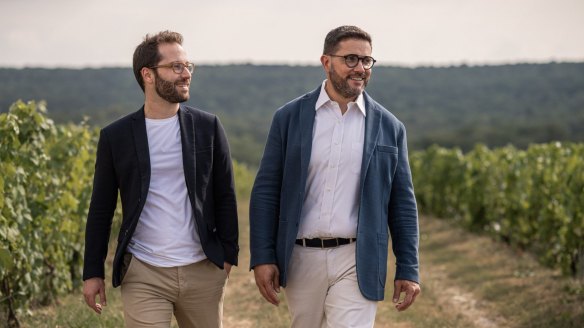 Piper-Heidsieck chief winemaker Emilien Boutillat (left) in the Reims vineyard with CEO Benoit Collard.