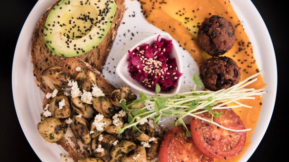 For Breakfast at Viffany's you get mushroom bruschetta tossed with a kale pesto and cashew fetta, avo on toast, glazed tomato and black bean, beetroot and brown rice fritters on a bed of sweet pumpkin puree.