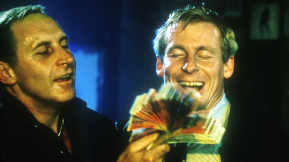 Tony Martin (playing Neddy Smith) and Richard Roxburgh (playing Roger Rogerson) in the television show Blue Murder. 