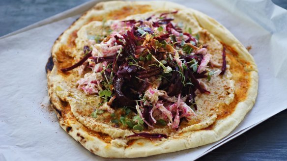 Chermoula chicken, beetroot and hummus pizza.