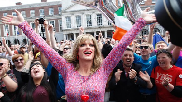 Rory O'Neill, known by the Drag persona Panti, celebrates with yes supporters at Dublin Castle after the result of Ireland's same-sex marriage vote was announced in 2015.