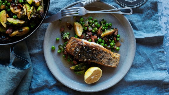 Crispy skin barra with mint peas and brussels with bacon peas mint and brussels at Three Blue Ducks in Sydney.