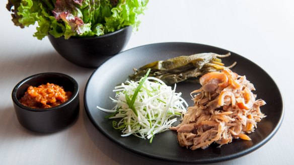 Jokbal ssam (lettuce wraps with pig trotter) by Korean chef Kim Byung-jin features on the menu at In Situ.