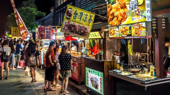 Visit the night markets to experience Taipei's street food.