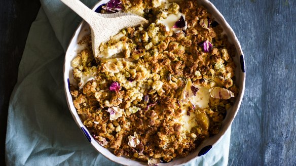 Pear crumble with pools of melted white chocolate.