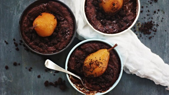 Pop a poached pear on top of each pud.
