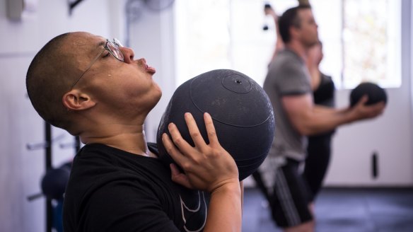 High intensity: Dan Hong has a session with his trainer twice a week and does F45 training (pictured).