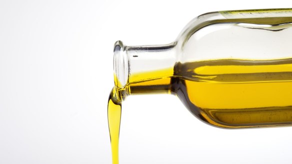 Olive Oil from a bottle Olive oil pouring from a bottle. iStock image downloaded under the Good Food team account (contact syndication for reuse permissions).