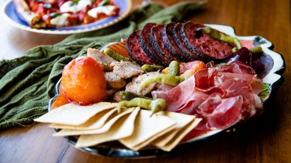 Coppa and butifarra with cornichons, sweet plum paste, crackers and Tonton bread. 