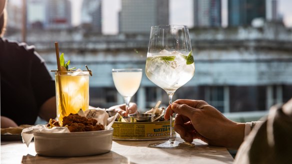 Cocktails at The Strand Rooftop above William Street in Darlinghurst.