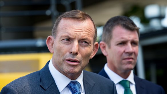  Prime Minister Tony Abbott and  Premier Mike Baird at Granville on Sunday. 