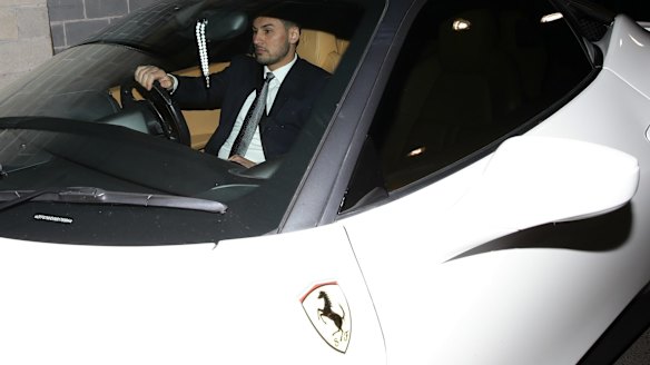 Auburn deputy mayor Salim Mehajer leaves an Auburn council meeting in his white Ferrari. 