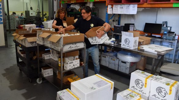Pepa Saya owner Pierre Issa and partner Melissa Altman pack butter and milk at their warehouse in Caringbah, Sydney.