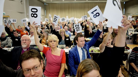 Norwegian Church Council leader Kristin Gunleiksrud Raaum (80) and chairman of the Oslo diocesan council Gard Sandaker-Nielsen (81) vote with others to marry same-sex couples.