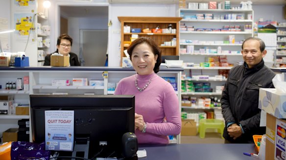 Liem, Kim, and Tan Dang are trying to stay positive about the future of the Narrabundah Pharmacy despite growing pressure from competitors.