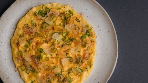 Brunch-driven: Omelette with shallots, confit garlic and bonito flakes.