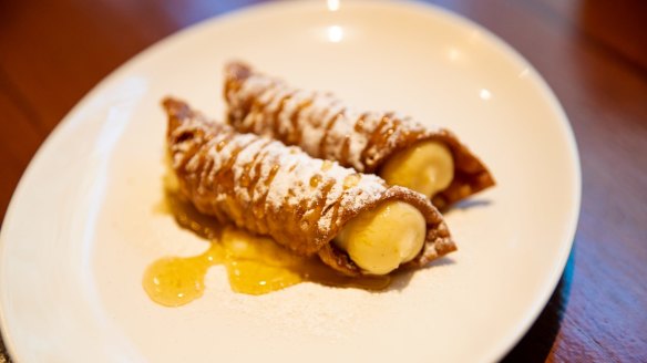 Cannoli filled with a loose creme brulee.