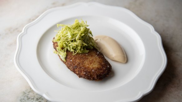 The mussel schnitzel is a croquette of mashed potato studded with mussel meat served with sauce Marie Rose.