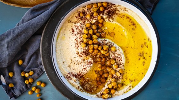 Whisk in a little hot water (or aquafaba if you've got it) to loosen up cold hummus.