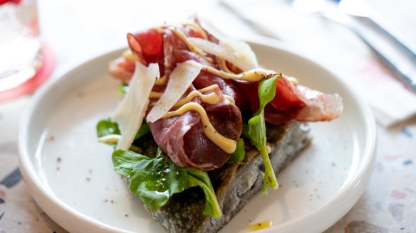 Bella focaccia, featuring wagyu bresaola carpaccio, parmigiano cream and mixed leaves.