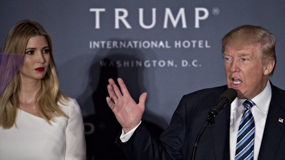Donald Trump with his daughter Ivanka during the opening ceremony for the Trump International Hotel in Washington, DC.