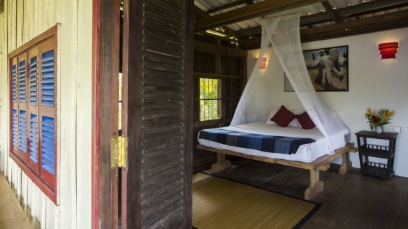 Champa Lodge provides rustic luxury accomodation in a Cambodian wood-stilt home.