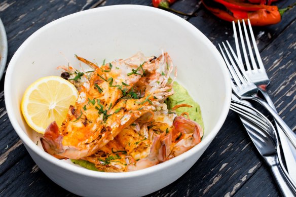 Confit garlic and chilli barbecue prawns with buttermilk, avocado and parsley recipe.