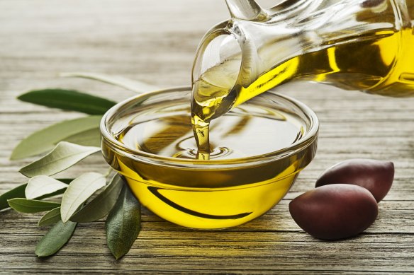 Extra virgin olive oils have healthy antioxidants such as biphenols, that catch on the back of the throat. 