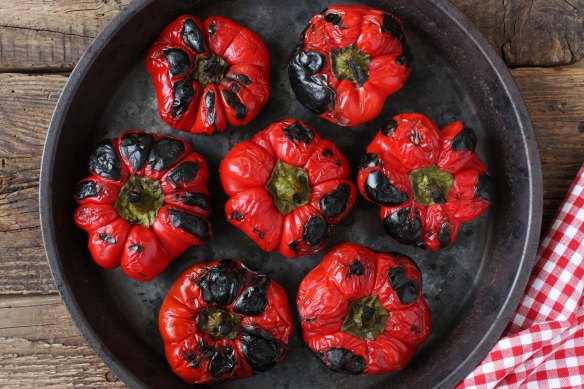 If you don't cook the capsicum enough, the skin will not lift off the flesh.