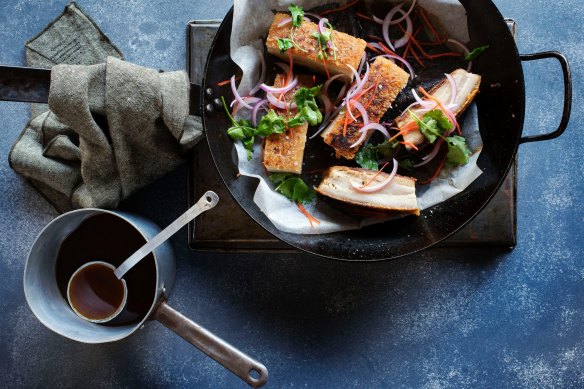Crispy-skin pork belly slow cooked in master stock with three-flavour sauce.