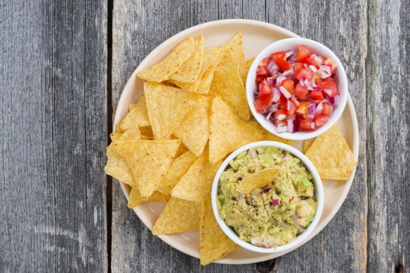 Mexicans never dip their corn chips into the salsa or guacamole.