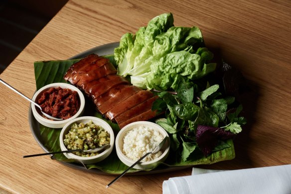 Babi guling (roasted suckling pig with sambals and fresh herbs), a daily special at Aru, Melbourne.