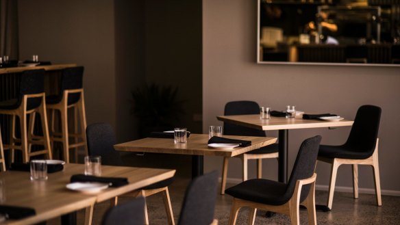 The soothing grey dining room at Igni in Geelong's backstreets.