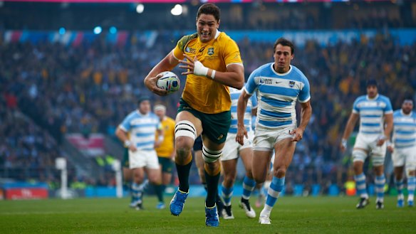 Opening try: Rob Simmons races through to score.