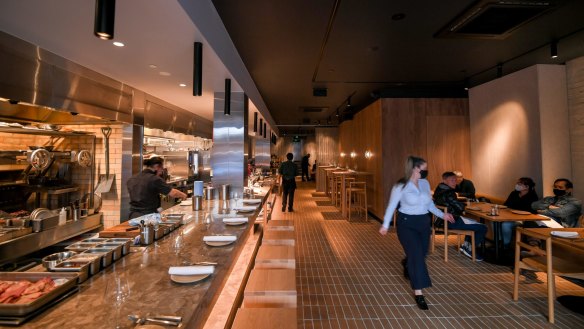 Aru's interior is in elemental tones of rock and timber.