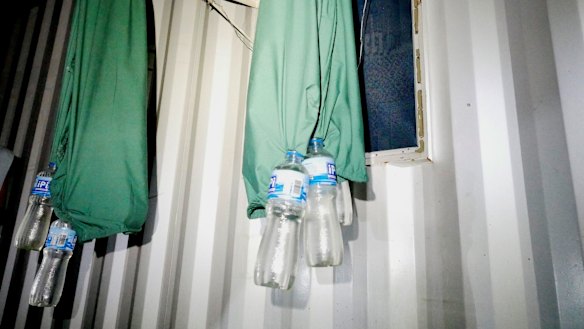 Bottles collecting rainwater to use for drinking at the former Manus Island detention centre.