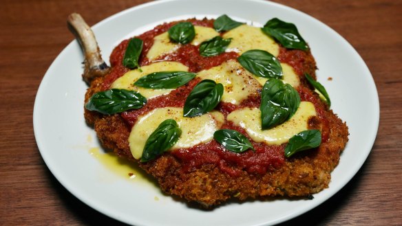 Bone-in veal parmigiana. 