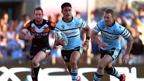 A year wiser: Valentine Holmes makes a break for Cronulla last August in the lead-up to his first NRL finals series.