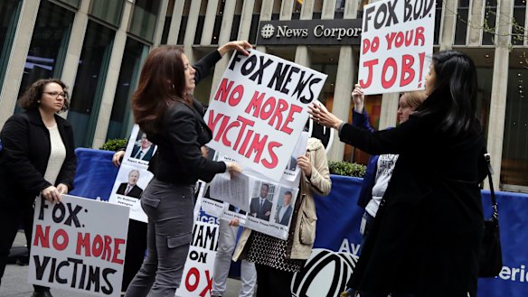 Protesters outside the News Corporation headquarters, in New York.