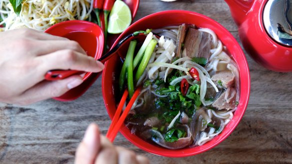 Although salty, a bowl of Vietnamese pho will help rehydrate and aid your recovery.
