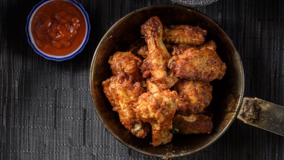 Many people enjoy wings that have a golden, sticky glaze. 