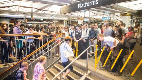 Commuters are temporarily prevented from entering platforms at Town Hall to avoid dangerous overcrowding.