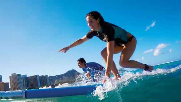 Surf the day away in Waikiki.