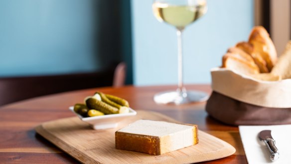 Duck and cognac pâté with cornichons or crackers.