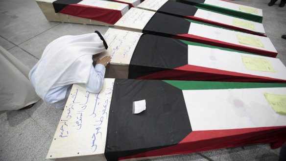 The coffins of victims of the bombing at the Imam Sadeq mosque in Kuwait City.