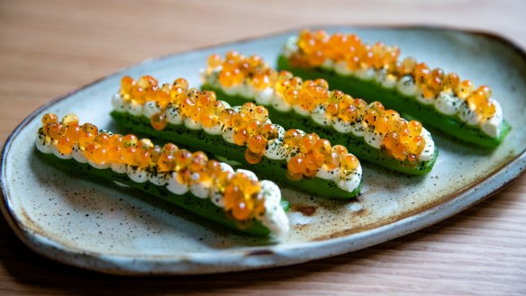  Pressed cucumber with smoked sour cream and salmon roe.
