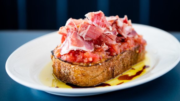 Pan tumaca (sourdough toast smothered with fresh tomato) and jamon iberico. 