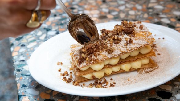 Bougatsa, oozing with creme patissiere and topped with walnut crumble and orange syrup.