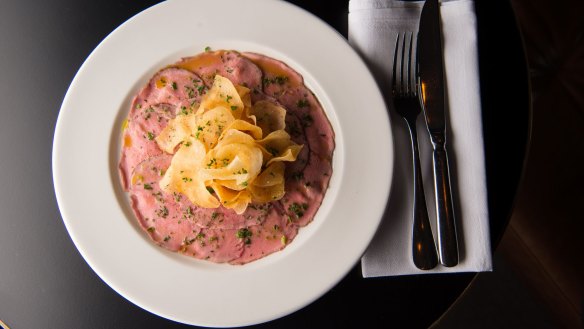 Paper-thin veal backstrap (vitello tonnato) with potato crisps.