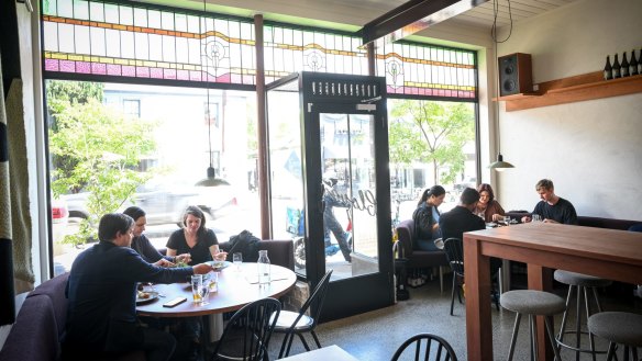 Sunlight streams in the double shopfront windows at Richmond wine bar Clover.